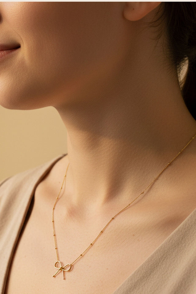 Gold Bow Pendant Necklace