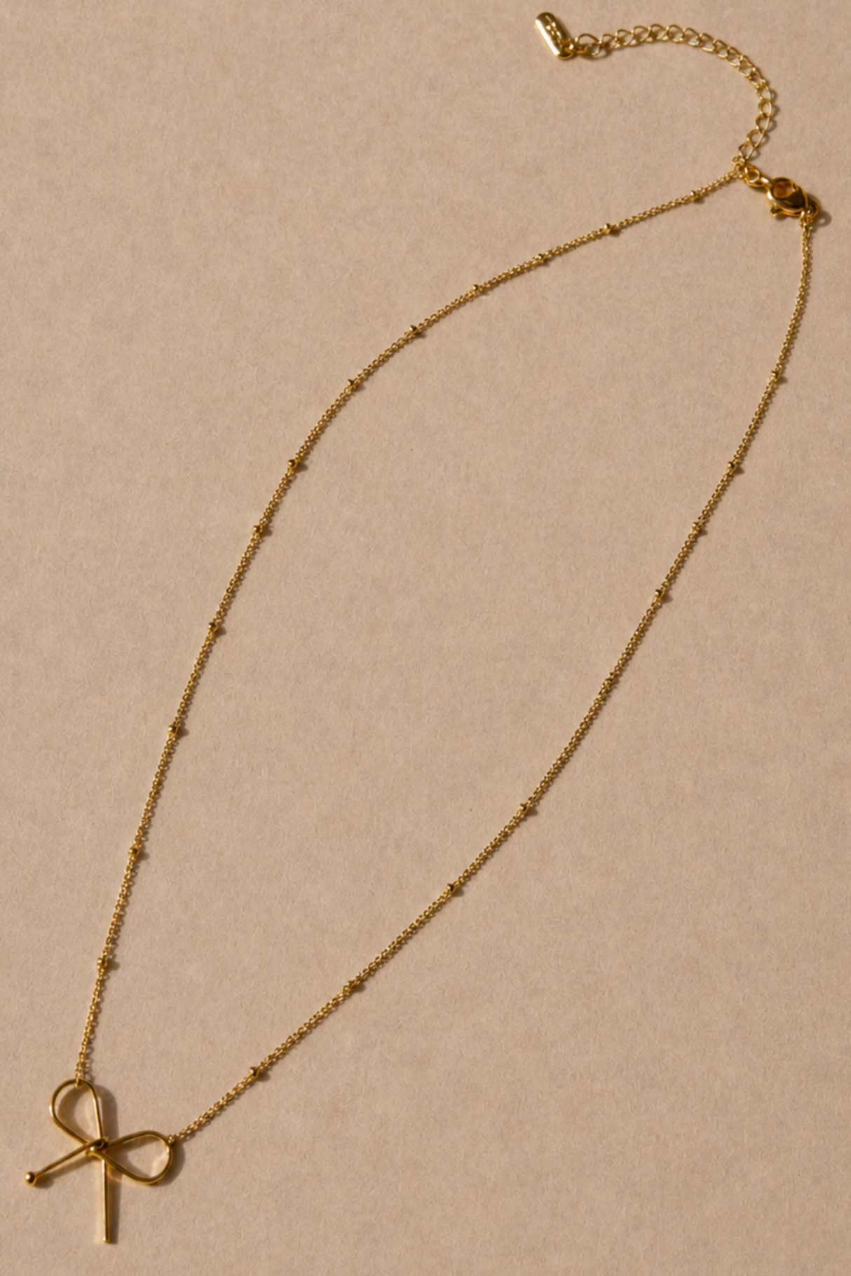Collier Pendentif Nœud Doré