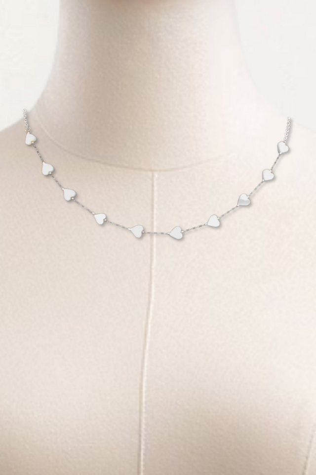 Collier en acier inoxydable avec coquillage en forme de cœur et argent