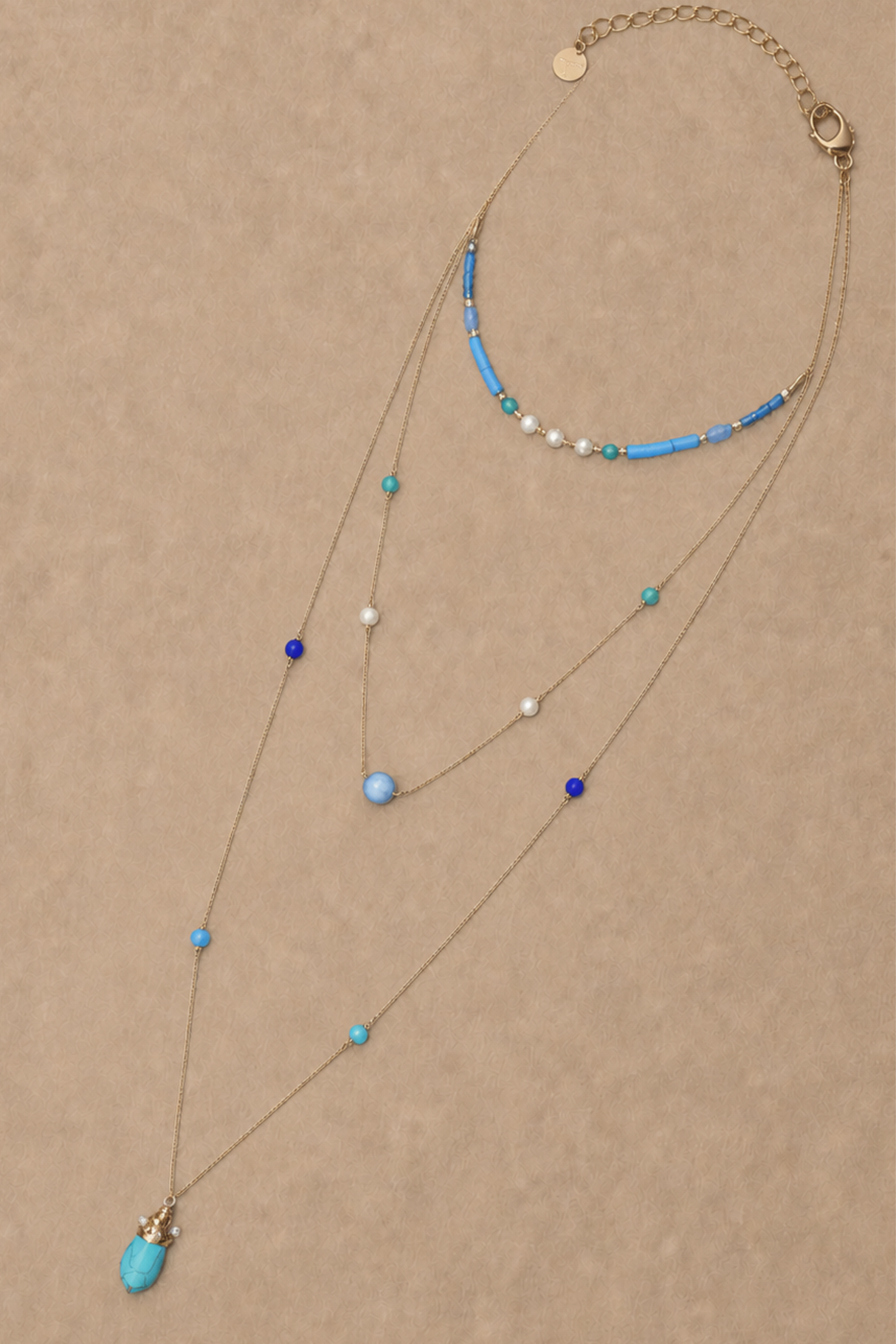Collier de perles superposées avec pendentif goutte turquoise – Collier en or à 3 rangs