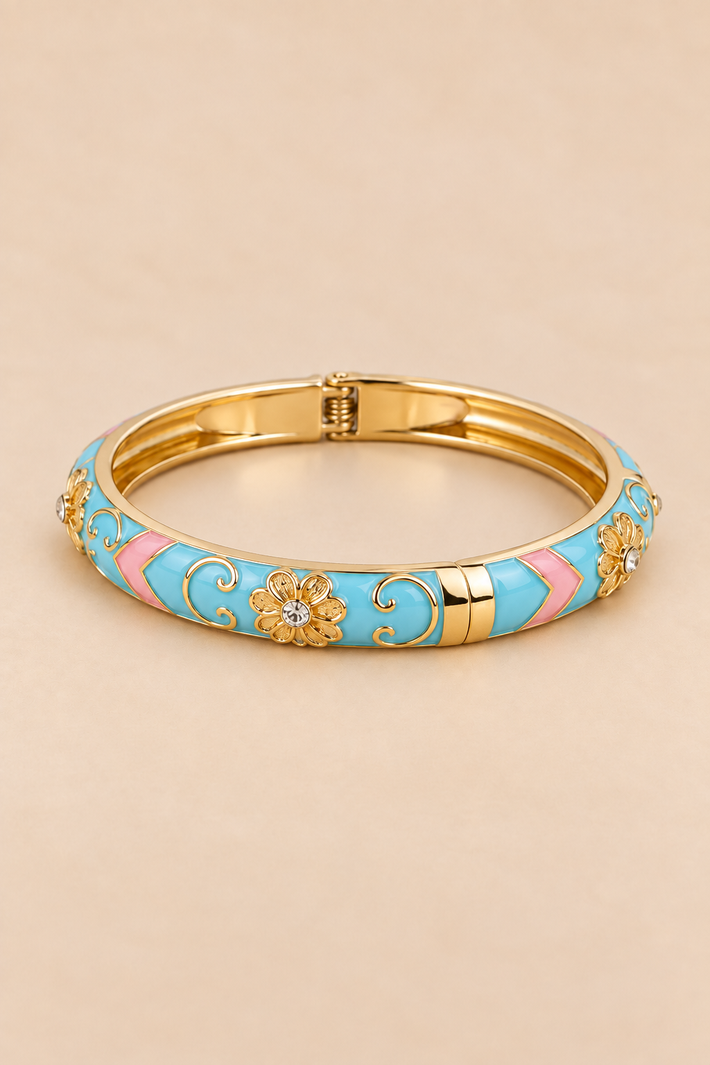 Jonc articulé émaillé bleu et rose avec fini doré