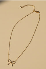 Collier Pendentif Nœud Doré