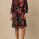 Mariah black multicolour floral dress front view on beige studio background