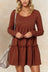 Vania, robe mini à manches longues et volants superposés