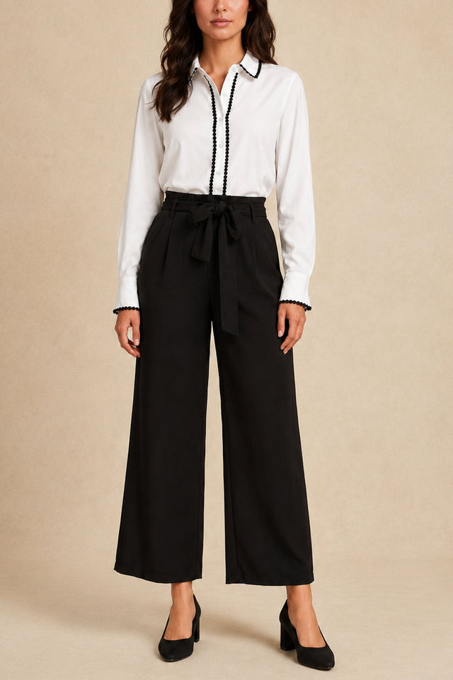 Addison black wide-leg tie-waist pants with white Amelie blouse, front view