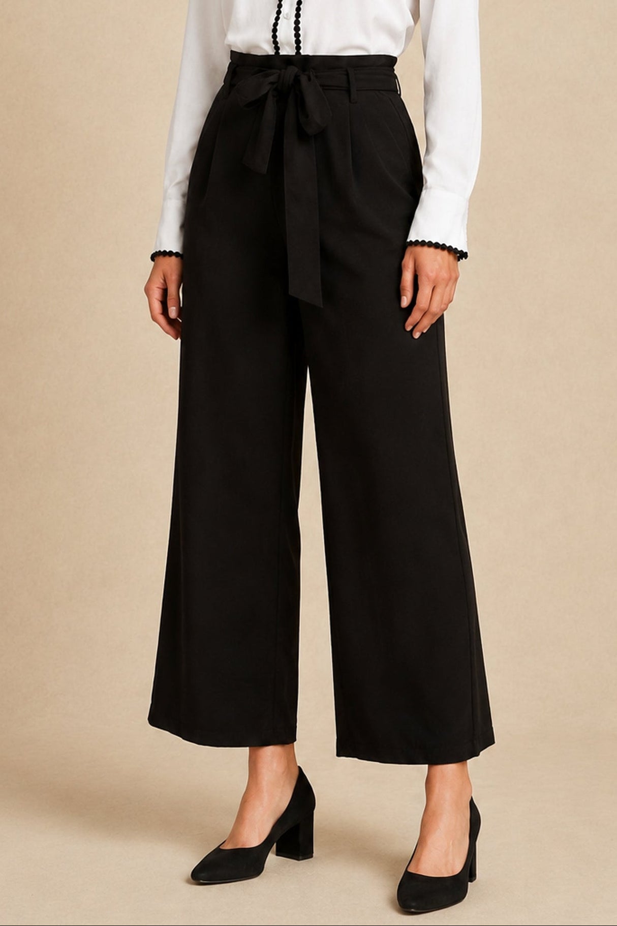 Addison black cropped wide-leg pants with self-tie waist, three-quarter view