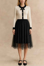 Robe Mélina midi ivoire en tricot et tulle noir vue de face