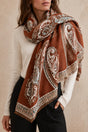 Rust-brown paisley fringe scarf worn by an ONZE model