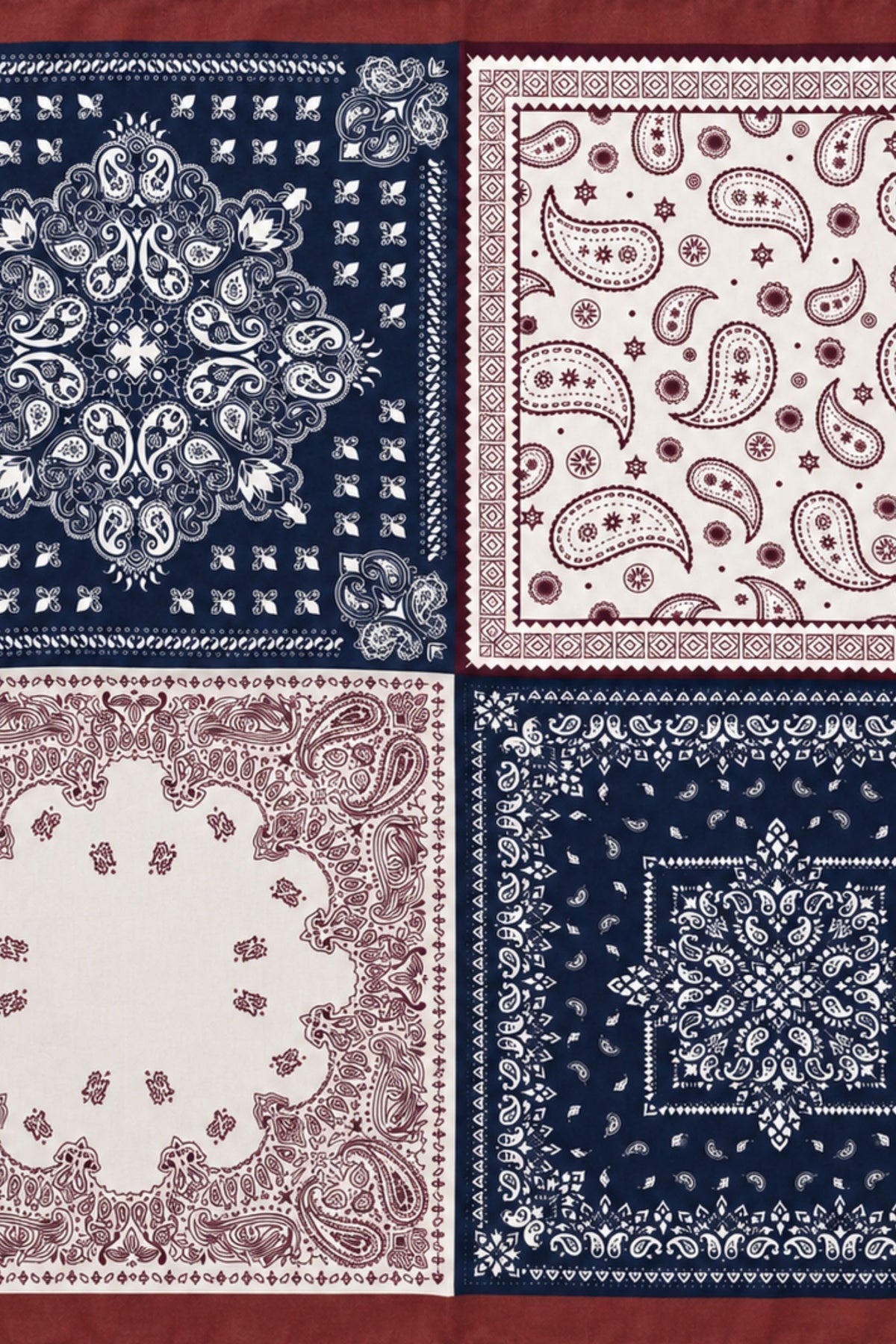 Flatlay of patchwork paisley square scarf in navy, ivory and burgundy
