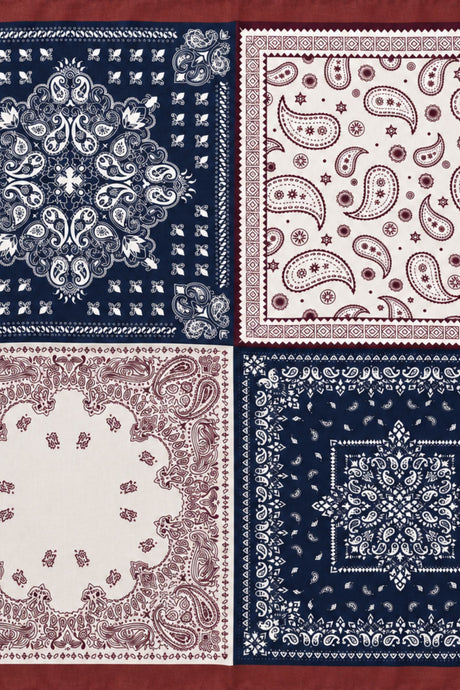 Flatlay of patchwork paisley square scarf in navy, ivory and burgundy